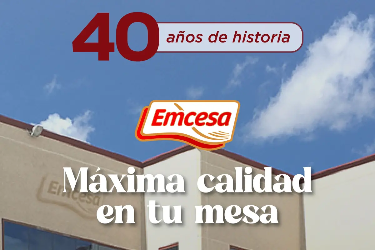 Anuncio de Emcesa celebrando 40 años de historia con el eslogan Máxima calidad en tu mesa sobre la fachada de la empresa Anuncio de Emcesa celebrando 40 años de historia con el eslogan Máxima calidad en tu mesa sobre la fachada de la empresa