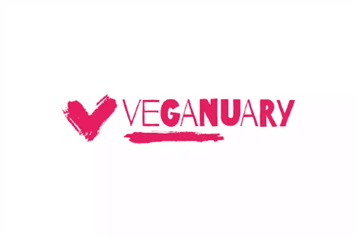 Logotipo de Veganuary con un corazón rojo a la izquierda.